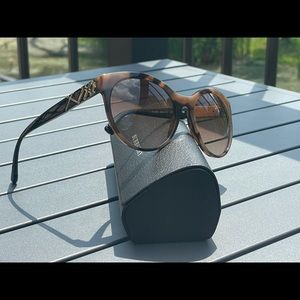 Burberry sunglasses.